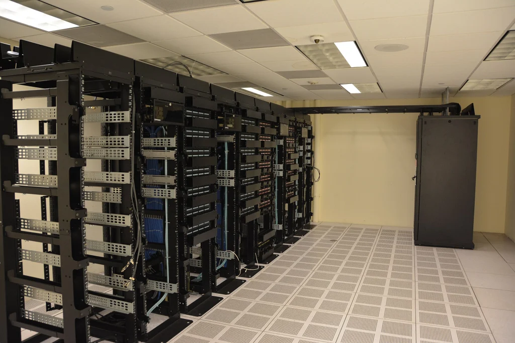Rows of server racks in a data center